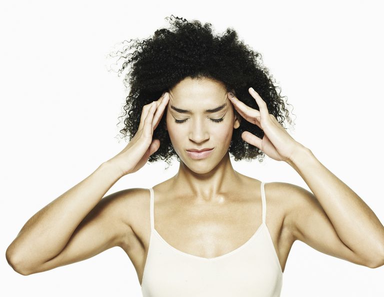 Cómo prevenir una fiebre en la cabeza en clase de yoga