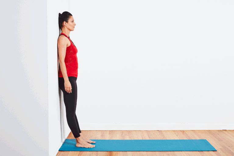 Standing Pilates Wall Roll Down